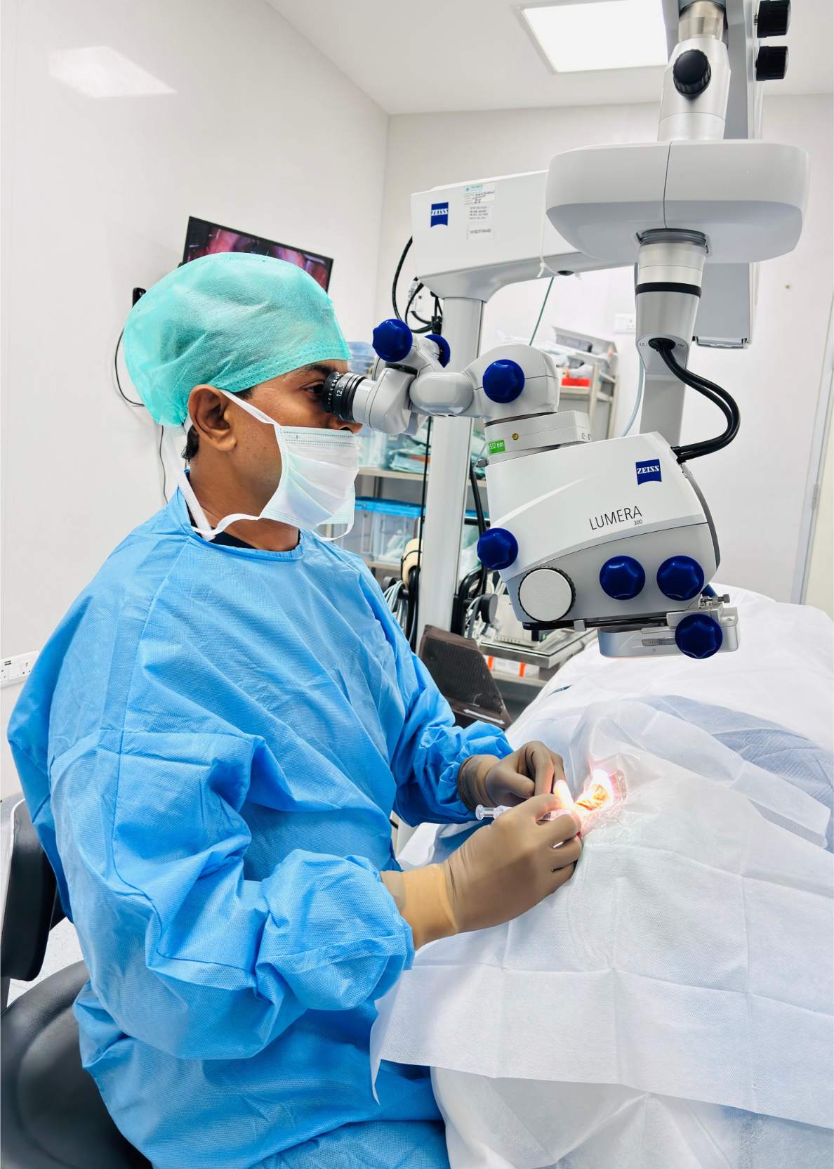 Ophthalmologist Dr. Bhanu Prakash M performing eye examination